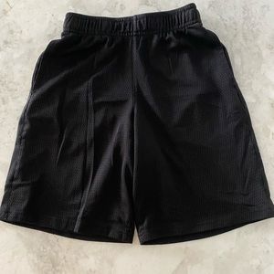 Boys black shorts. Size M